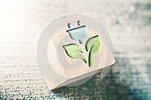 Clean Eco Power Icon On A Wooden Block On A Table