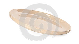 Clean empty beige plate isolated