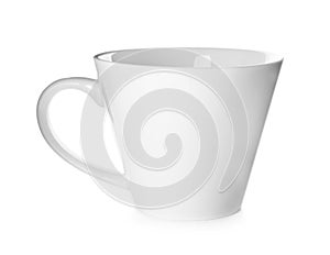 Clean empty ceramic cup isolated on white