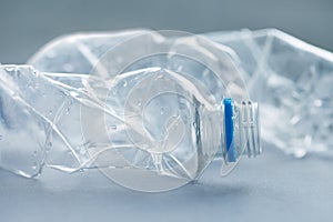 Clean empty crumpled plastic water bottles background