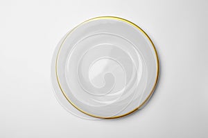 Clean empty plate on white background