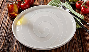 Clean empty white ceramic pizza plate