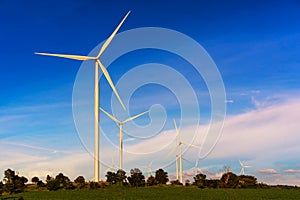 Clean energy; Wind turbine generates electricity in agricultural