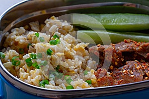 Clean food,Fried rice with chicken wooden background.