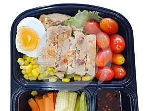 Clean food style, Top view of grilled chicken, boiled egg and vegetable salad