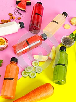 Clean fresh organic juice in colorful collection of beverage bottle extract from variety of natural ripe fruit and vegetable for