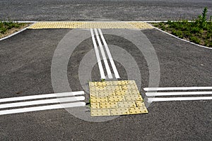 Clean freshly crosswalk with integrated guidelines for people with visual impairment