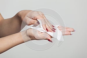 Clean hands with wet wipes