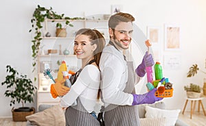 Clean house concept. Man and woman doing housekeeping