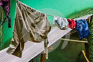 Clean laundry hanging to dry on a wash line, natural drying method