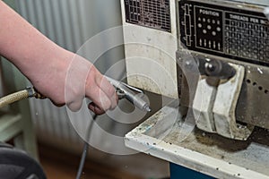 Clean the machine with a compressed air gun