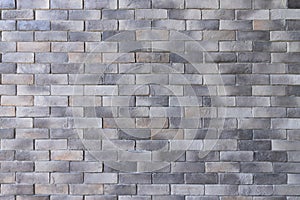 Clean minimal style of modern loft of small grey brick wall background texture