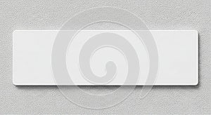 Blank White Rectangular Plaque on Textured Grey Background