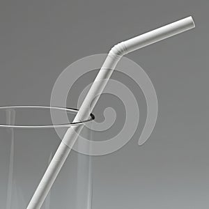 A clean, minimalistic image of a transparent glass featuring a white, bendable plastic