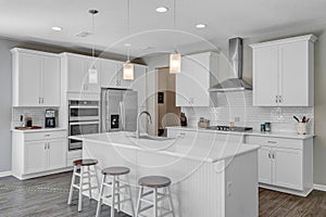 Modern and clean white kitchen photo