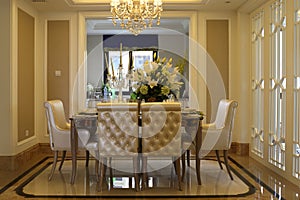Clean and neat family dining room of a window photo