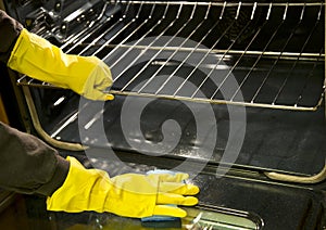 Clean the oven with sponge background photo