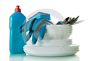 Clean plates and Cutlery, detergent, sponge and gloves isolated on white