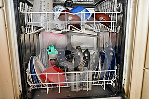 Clean plates, forks, spoons and other utensils after washing in the dishwasher