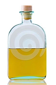 Clean refined oil in the classic glass bottle photo