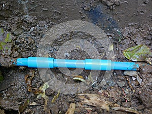Clean repaired underground broken / leaked / cracked PVC, polyvinyl chloride, water pipe after it was fixed photo