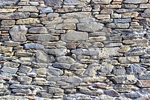 Clean shoot of contrast masonry stone wall made by turkish wall craftsman