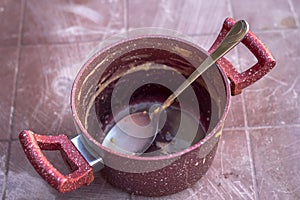 Clean shoot of red colored traditional cooking pot
