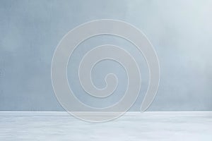 Minimalist interior with gray wall and floor in a bright and airy space