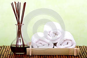 Clean spa towels and essential oil