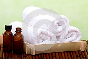 Clean spa towels and essential oil