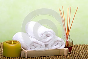 Clean spa towels and essential oil