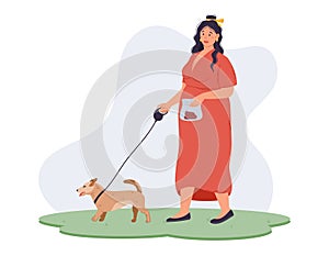Clean up after your Pet Concept. Young overweight woman walking her dog on a leash on the grass and holding excrement in a plastic