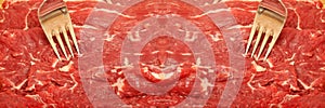 Clean very fresh red raw meat beef and fork, cow meat texture