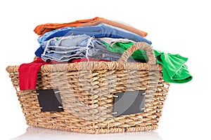 Clean washed fresh clothing in a wicker basket