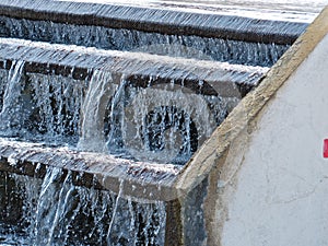 Clean water flowing on a distribution tank