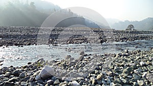 Clean water small river flowing in mountain valley