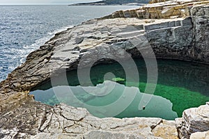 Clean waters of Giola Natural Pool in Thassos island, Greece