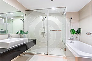 Clean and white bathroom with amenities photo