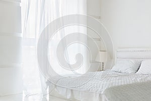 Clean white bedroom interior