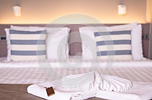 Clean white hotel towels on bed,Beautiful of fluffy bath towels