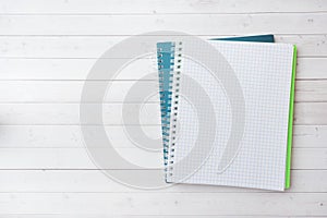 Clean white notebook and pencil with copy space on white table background for presentation, writer or school education, blogger,