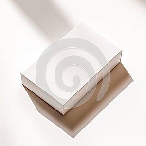 Clean white rectangular box mockup with dramatic shadows and subtle texture