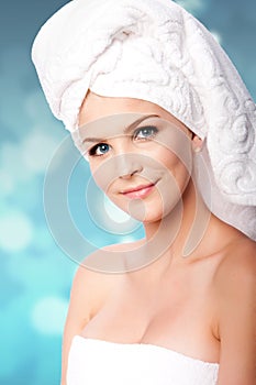 Clean woman in towels after bath shower