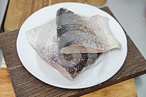 Cleaned raw fish on the plate