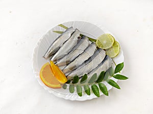 Cleaned and ready to cook fresh indian oil sardine photo