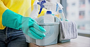 Cleaner, hands and person with basket of chemical cleaning supplies, hygiene and gloves with product to disinfect