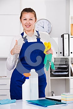 Cleaner woman is satisfied after cleaning