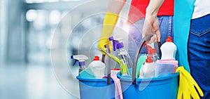 Cleaners with buckets and cleaning products