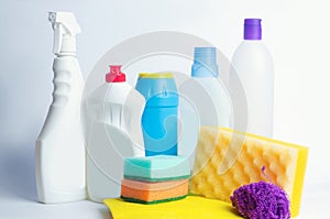 Cleaners on an isolated white background, housekeeping , supplies, concept of cleanliness