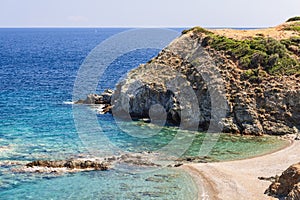 The cleanest and absolutely deserted secluded small beach in Sithonia Cape with fine sands, Aegean Sea, Toroni, Chalkidiki, Greece